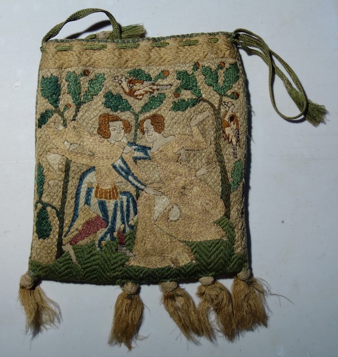 Fourteenth century embroidered bag depicting a pair of lovers. Sens Museum (B324).