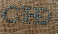 Linen and silk sampler from the Netherlands, c. 1800 (TRC 2020.3682), with the initials CHD.