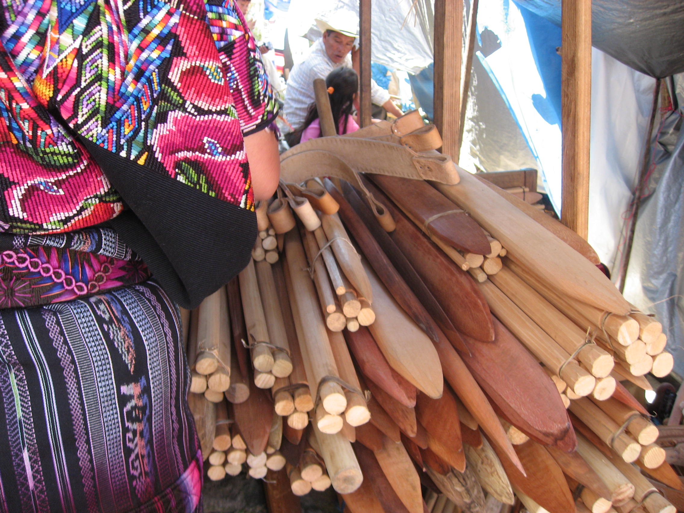 Choosing a loom, Chichicastenango, Guatemala (2007). Photograph by Caroline Stone.