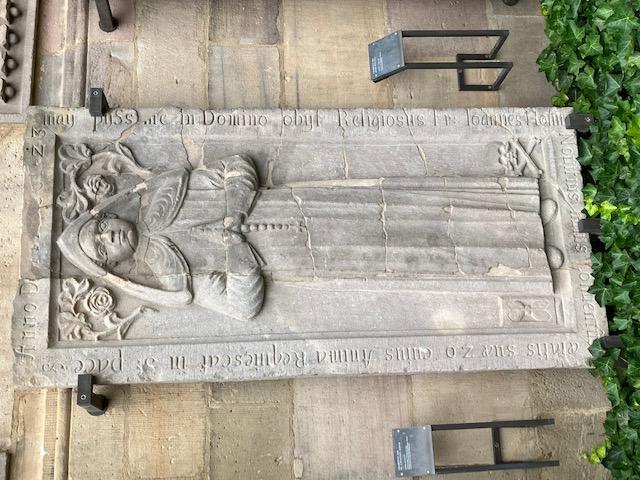 Gravestone for Frater Johannes Höhn, who died in 1701, Fulda. The stone is executed in imitation of late medieval gravestones for monks. Photograph by Willem Vogelsang.