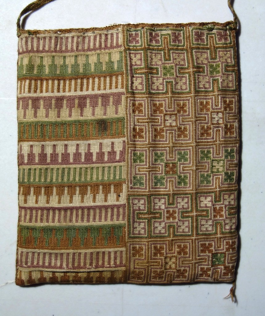 Front of an embroidered bag (B320) dating to the 13th century now in the Sens Museum, France. Photograph by author.