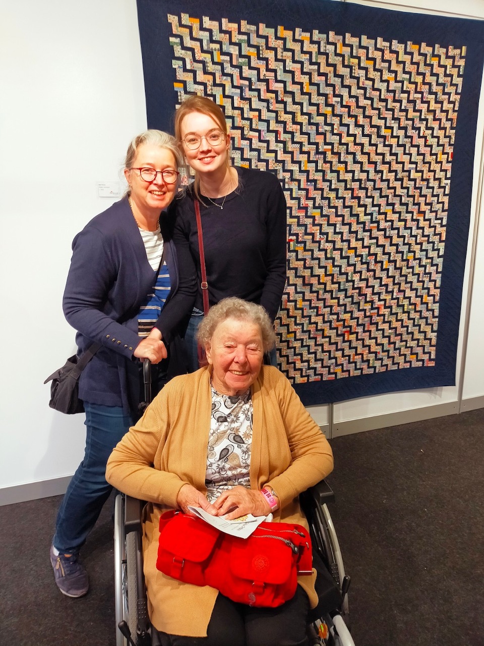 Three generations of quilters at the TRC display of quilts in Rijswijk, the Netherlands, October 2021.