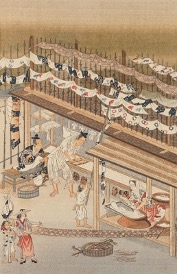 A Japanese woodcut by Kano Yoshinobu (1552-1640) depicting a stencil dyeing workshop with a range of textiles drying in the sun  Kita’in temple, (20th century reproduction, private collection).