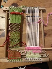 Practising weaving (left) and velvet-making (right) on a frame. May 2022. Photograph by author.