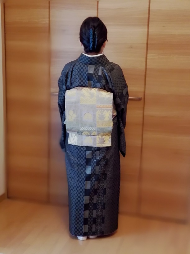 A friend of the author wearing a Japanese obi (sash), with Andean (pre-Hispanic South American) motifs, c. 2000 (TRC 2022.0233).