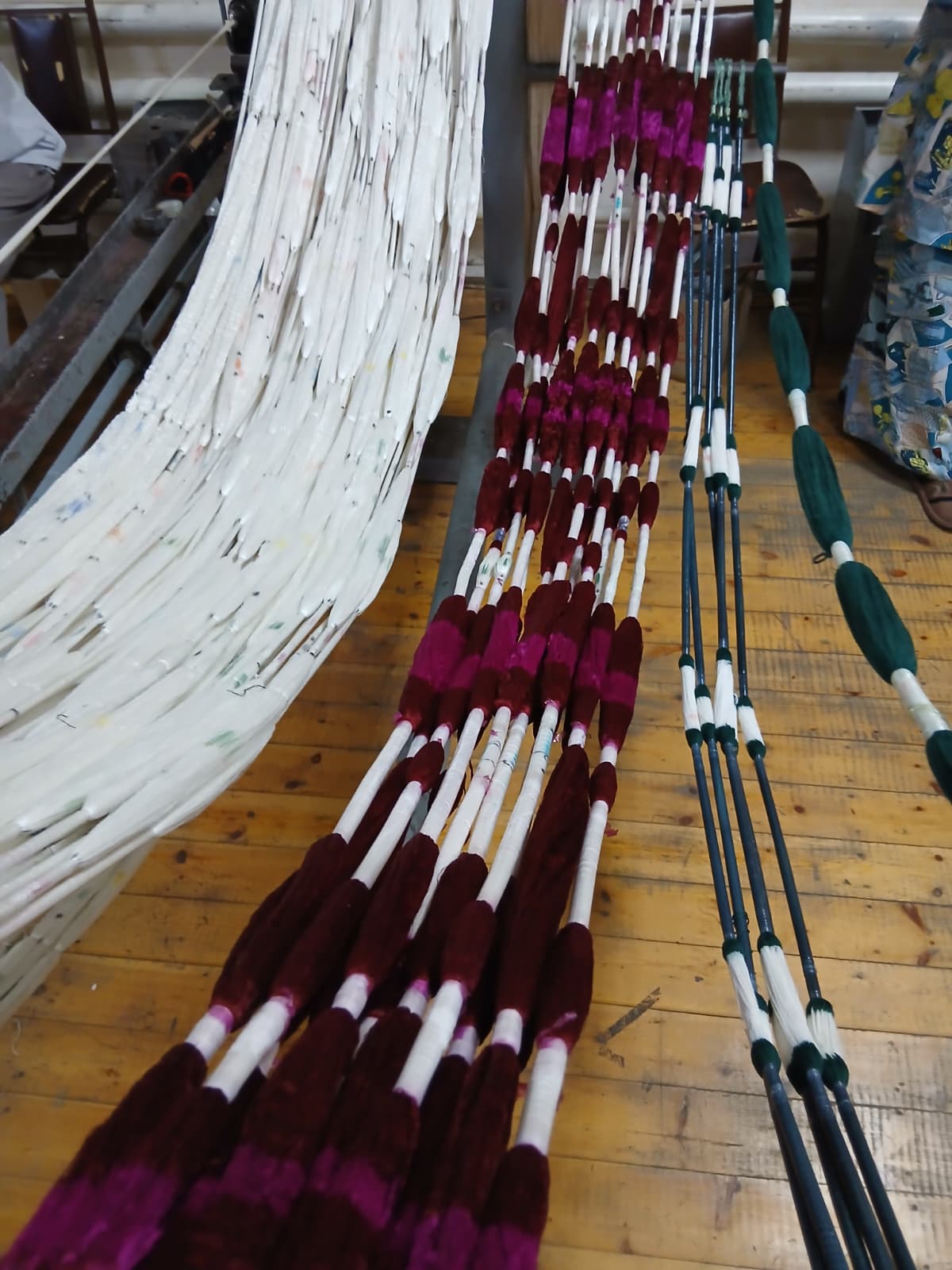 Threads bound and dyed. Photograph by author.