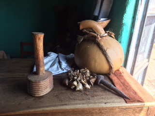 Various objects, including a mallet, related to the bark cloth industry, Uganda, early 2021 (photograph Caroline Stone).