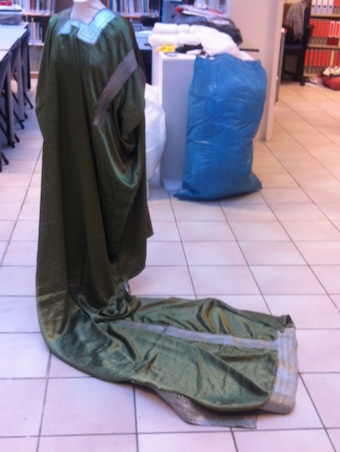 Dress with long train from the island of Socotra, displayed in the TRC Gallery (TRC 2015.0551).