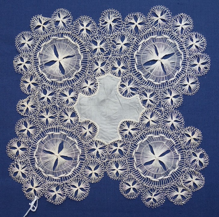 Tenerife lace doily with medallions of various sizes, early 20th century (TRC 2021.0995).