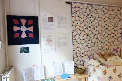 Exhibition starts with the quilt block ' Dutchman's breeches', to the left. The quilt to the right is called 'Birds in the Air'.