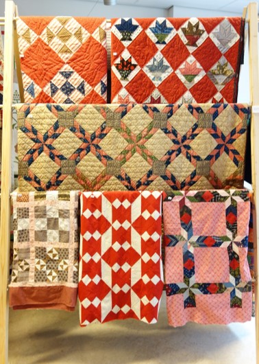 A selection of quilts and quilttops from the 1880's and 1890's.